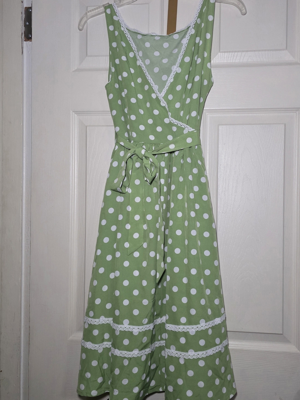 Sleeveless Green Polka Dot Wrap Dress with Lace Trim